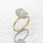 Load image into Gallery viewer, 2.30 Carat Oval Cut Moissanite Hidden Halo Engagement Ring in Yellow Gold