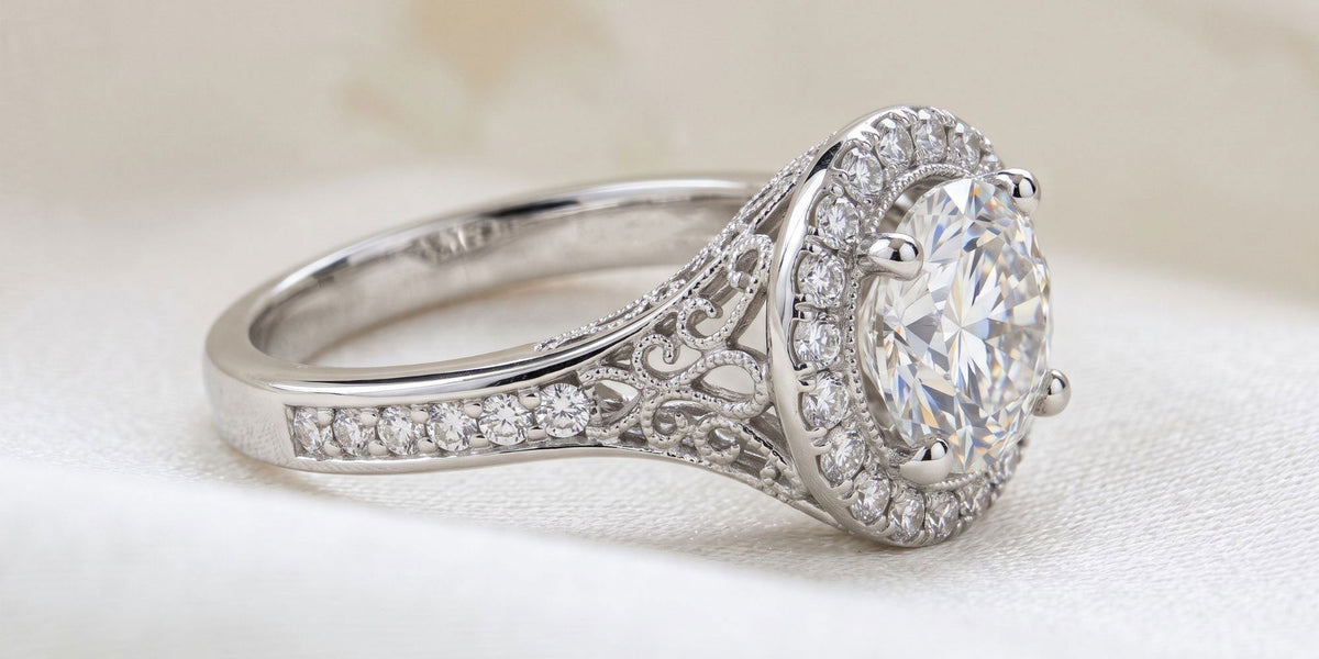 Round halo ring with intricate under gallery filigree detailing