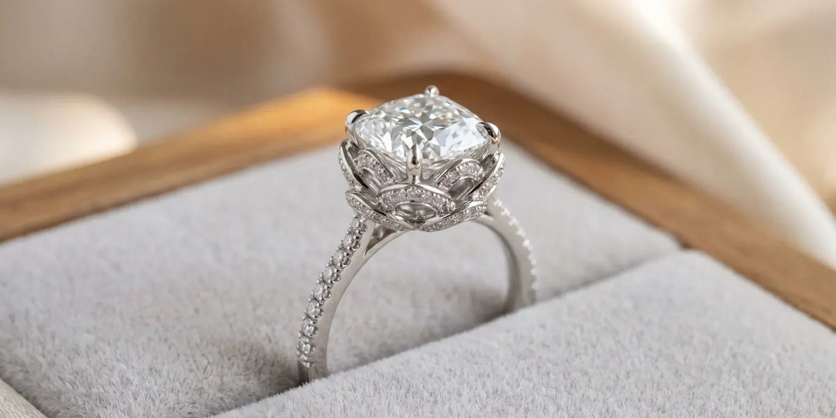 Cushion solitaire accent ring with a delicate petal gallery structure