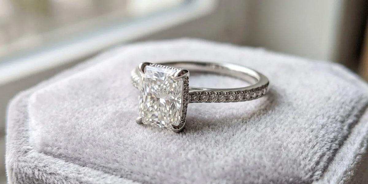  radiant solitaire accent ring with micro pavé under rail detailing