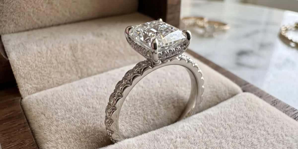 Radiant cut hidden halo ring with scalloped profile rim: sophisticated sparkle with architectural elegance