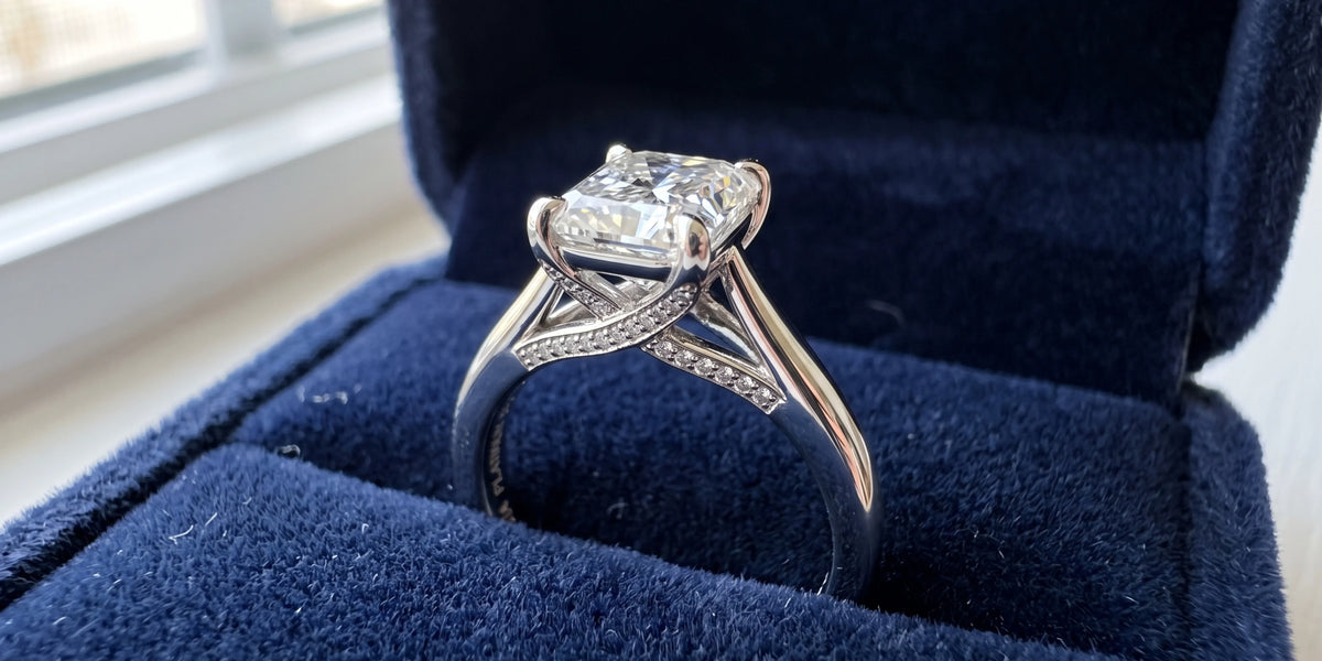 Radiant cut solitaire ring with crisscross under gallery architecture
