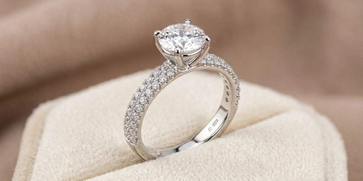 Round solitaire accent ring: brilliant beauty with dual row radiance