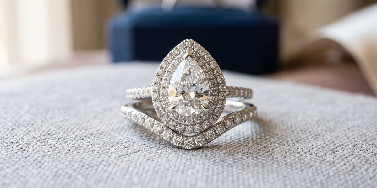 Pear double halo ring with a matching nested band set