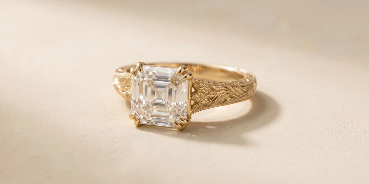 Asscher solitaire ring with leaf engraved shoulder accents