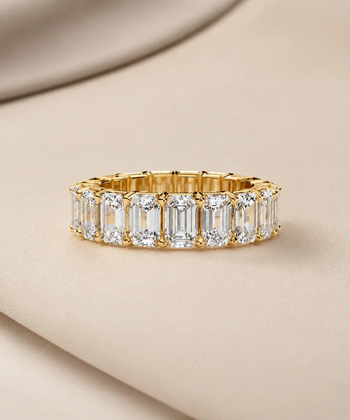 Moissanite eternity bands in yellow gold