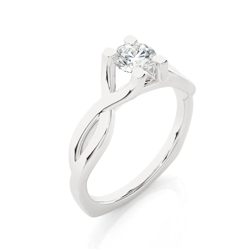 Angled view of 0.50 Ct Moissanite Twisted Solitaire Engagement Ring In White Gold, showcasing the band and setting.​