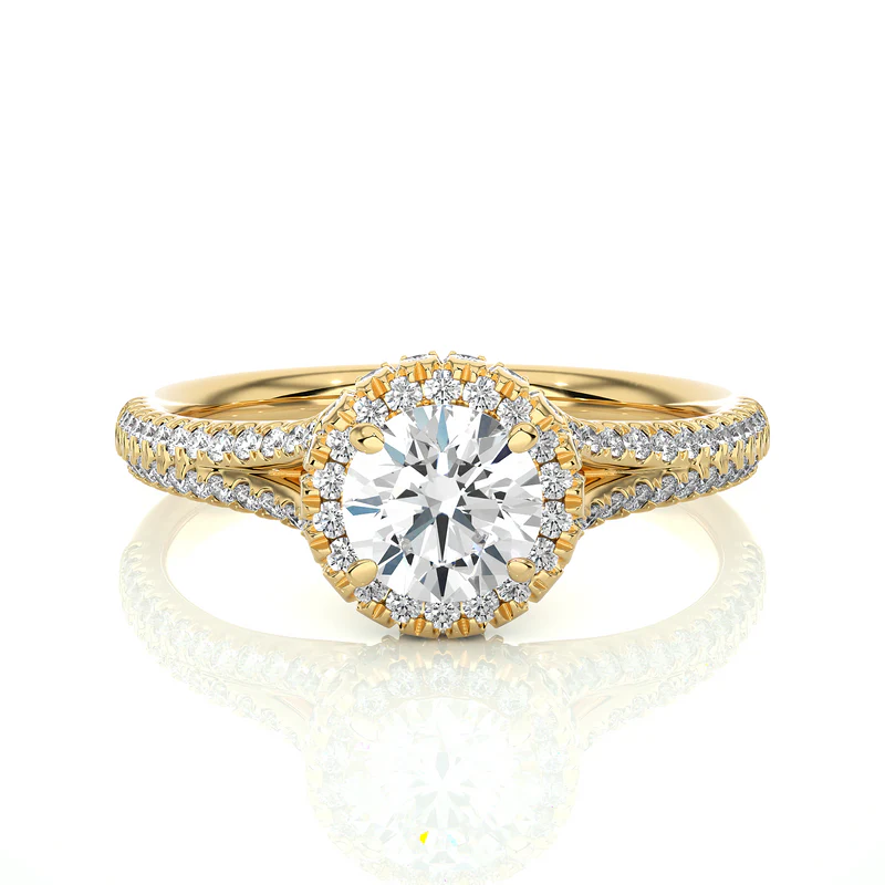Front view of 1.50 Carat Round Moissanite Split Shank Halo Engagement Ring In Yellow Gold, highlighting the brilliant center moissanite stone.