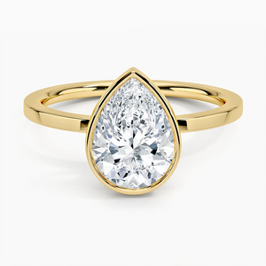 1.50 Ct Pear Cut Moissanite Bezel Set Engagement Ring in Yellow Gold