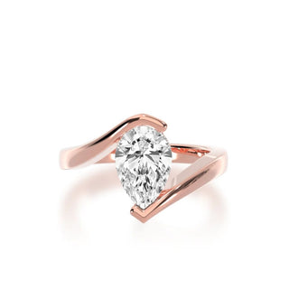 1.5 Carat Pear Shape Bypass Solitaire Moissanite Engagement Ring In Rose Gold