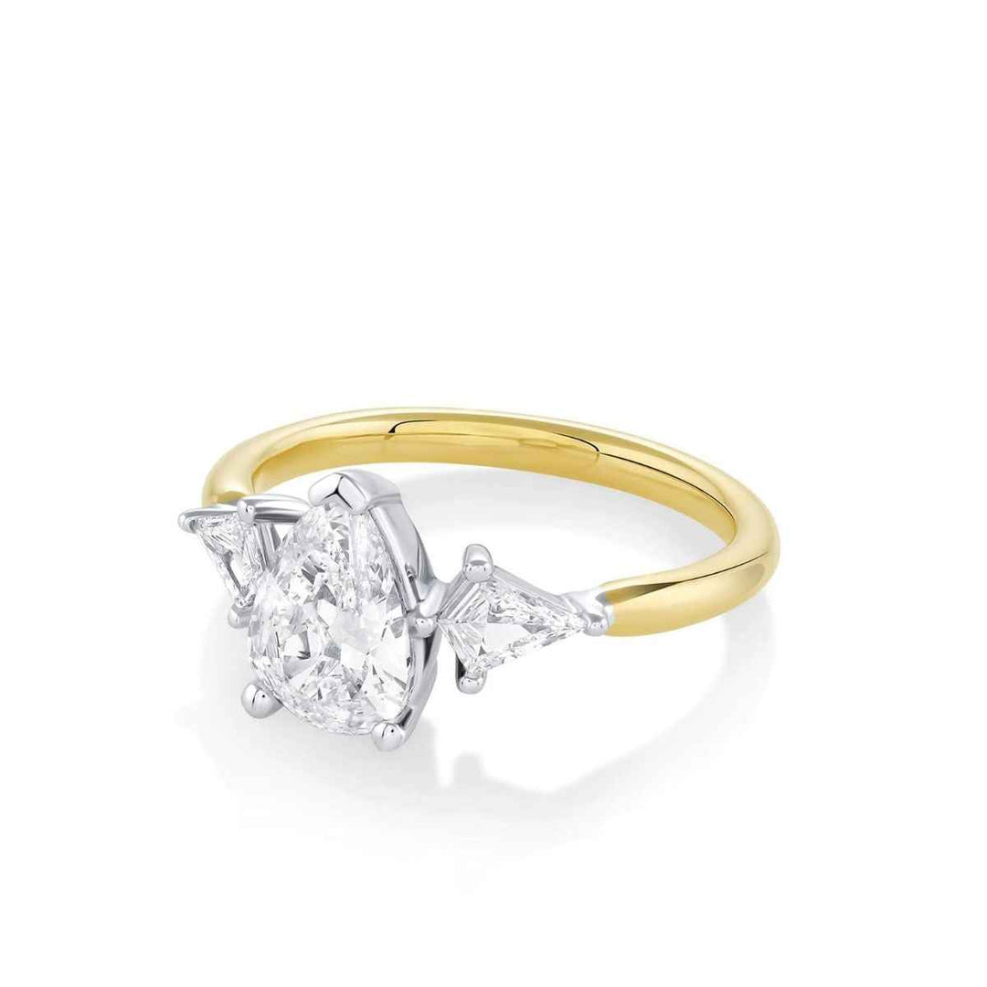 1.50 Carat Pear & Kite Shape Moissanite Three Stone Ring In Yellow Gold
