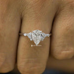 Load image into Gallery viewer, 1 Carat Pear Shaped Moissanite Cluster Ring
