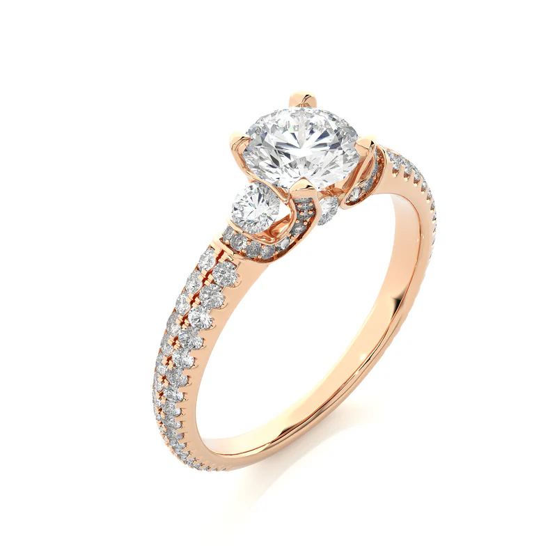 Angled view of 1 carat round shaped moissanite engagement ring with accents in rose gold, showcasing the band and setting