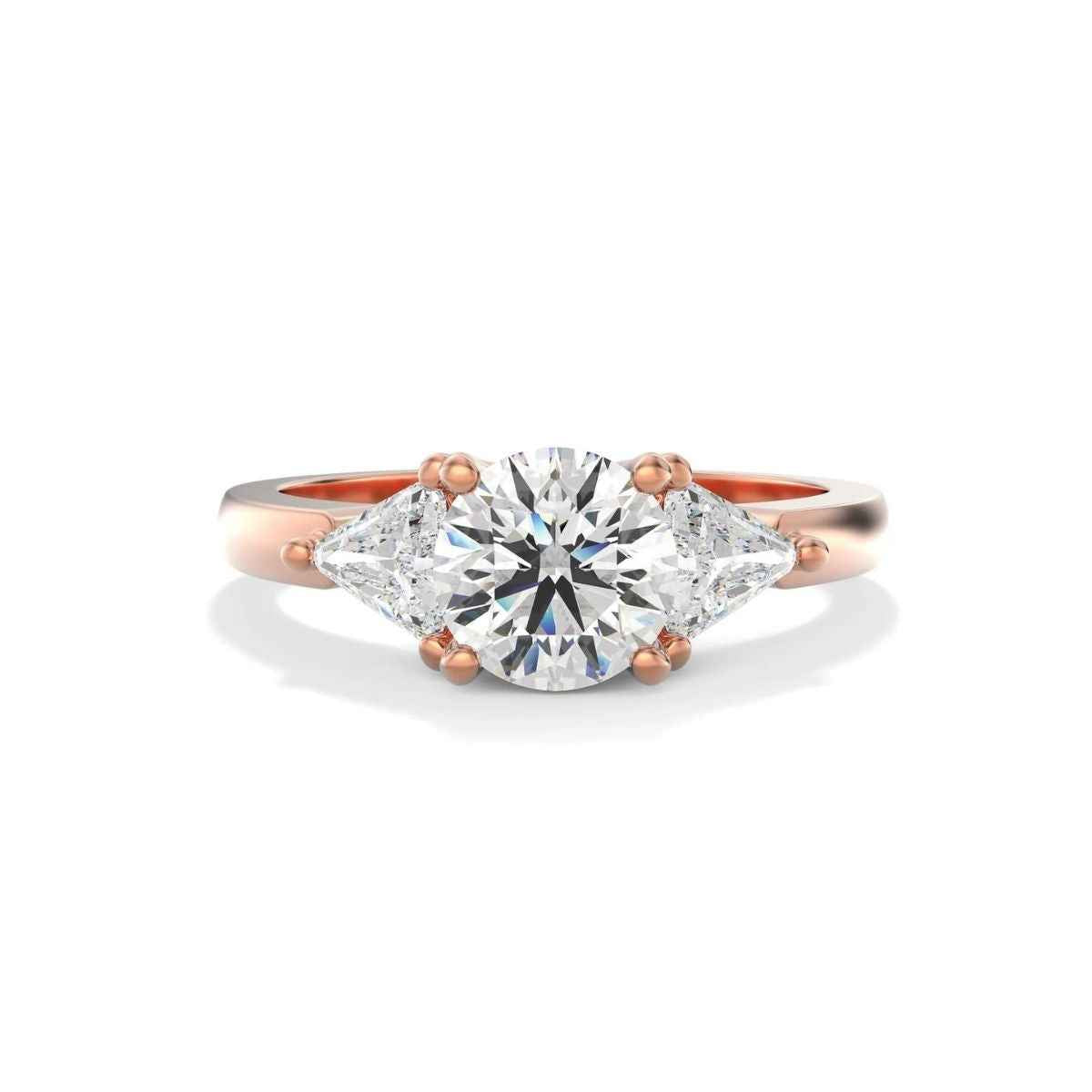 2 ct round & trillion cut moissanite three stone ring in rose gold