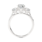 Load image into Gallery viewer, Side profile of 2.50 Carat Round Moissanite Three Stone Engagement Ring in Silver, highlighting the prong setting.
