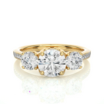 Load image into Gallery viewer, Front view of 2.50 Carat Round Moissanite Three Stone Engagement Ring in Yellow Gold, highlighting the brilliant center moissanite stone.

