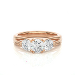 Load image into Gallery viewer, Front view of 2 Carat 3 Stone Round Cut Moissanite Ring in Rose Gold, highlighting the brilliant center moissanite stone.
