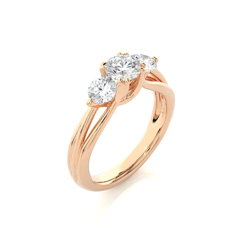 2 carat 3 stone round cut moissanite ring in rose gold