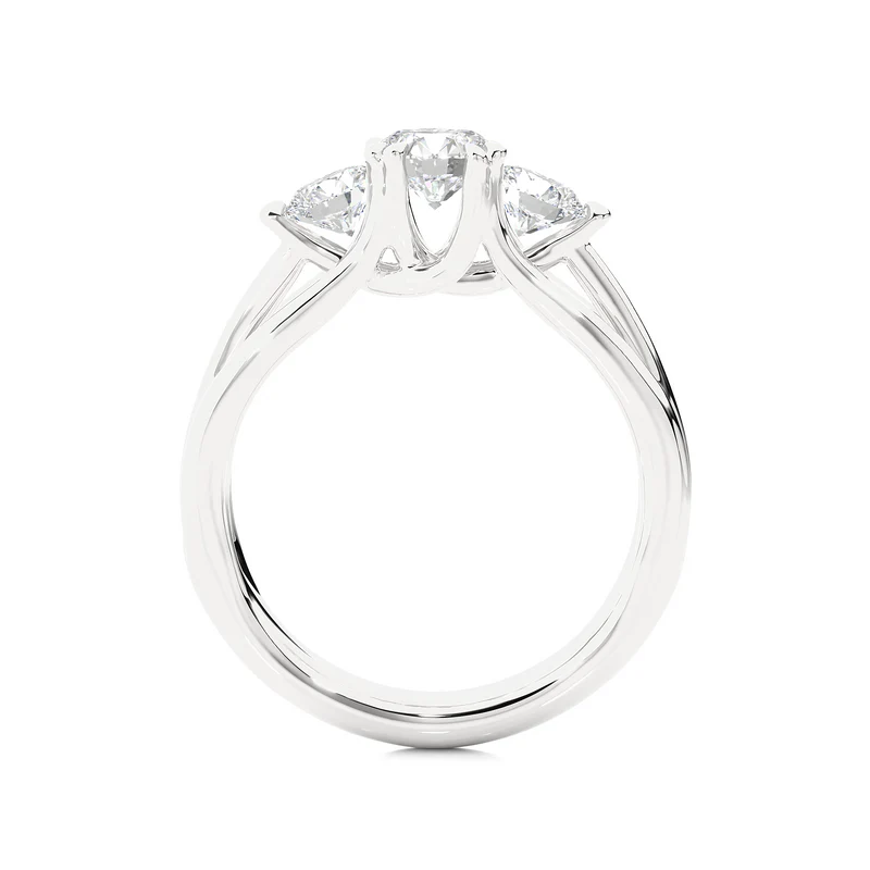 Side profile of 2 carat 3 stone round cut moissanite ring in white gold, highlighting the prong setting