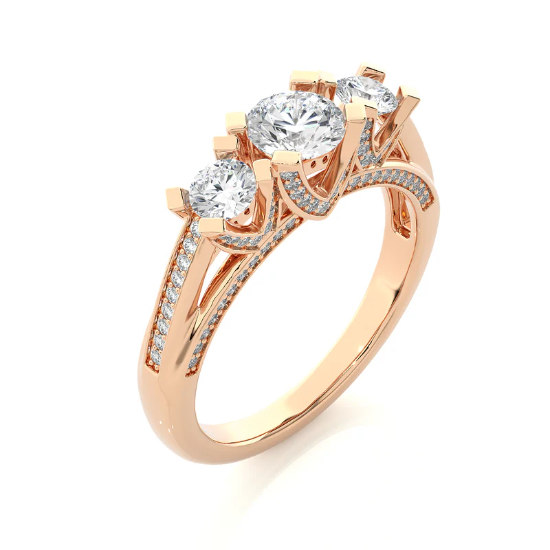 Angled view of 2 ct moissanite three stone engagement ring with accent in rose gold, showcasing the band and setting