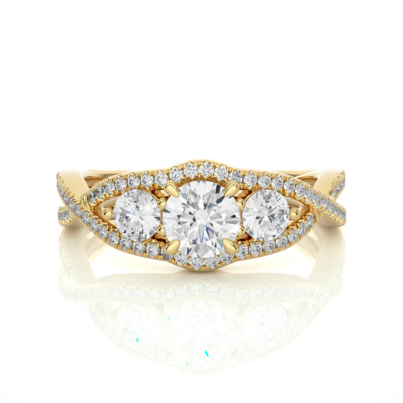 Front view of 2 carat round shaped moissanite three stone twisted engagement ring in yellow gold, highlighting the brilliant center moissanite stone