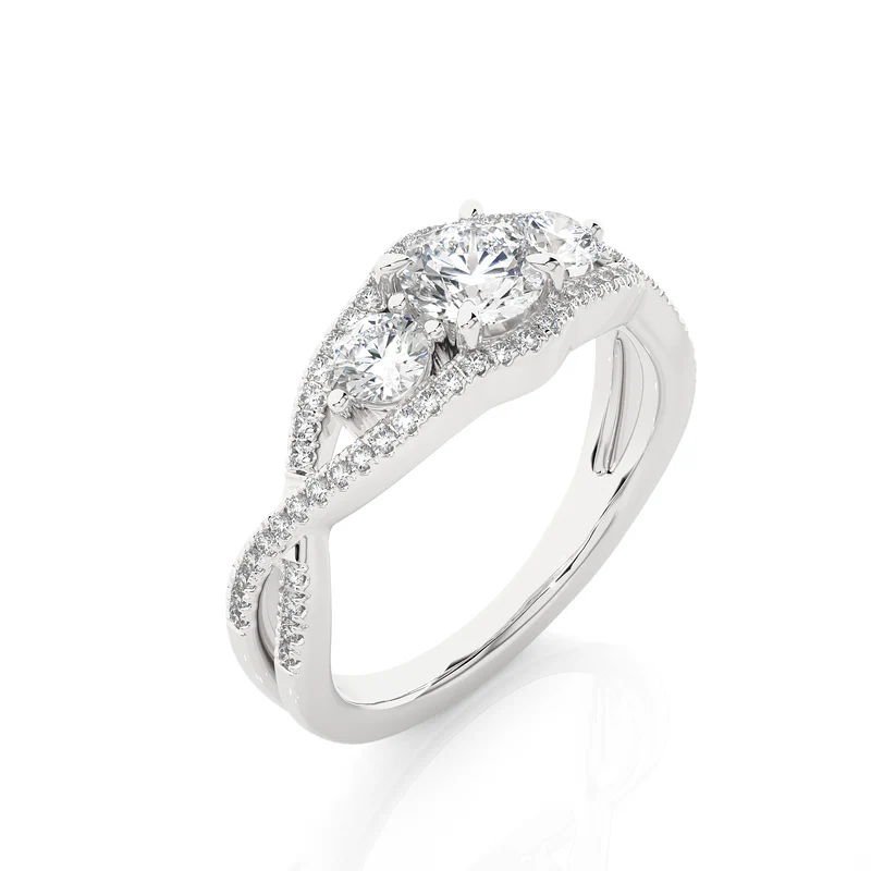 Angled view of 2 carat round moissanite three stone twisted engagement ring in white gold, showcasing the band and setting