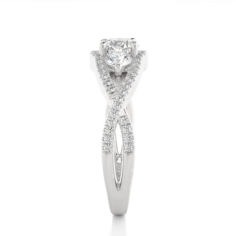 Side profile of 2 Carat Round Moissanite Three Stone Twisted Engagement Ring in White Gold, highlighting the brilliant center moissanite stone, highlighting the prong setting.