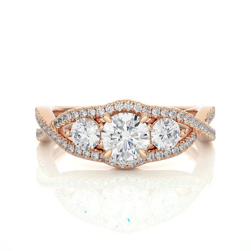 Front view of 2 carat round moissanite three stone twisted engagement ring in rose gold, highlighting the brilliant center moissanite stone