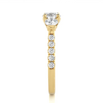 Load image into Gallery viewer, 2 Carat Round Moissanite Engagement Three Stone Ring In Yellow Gold
