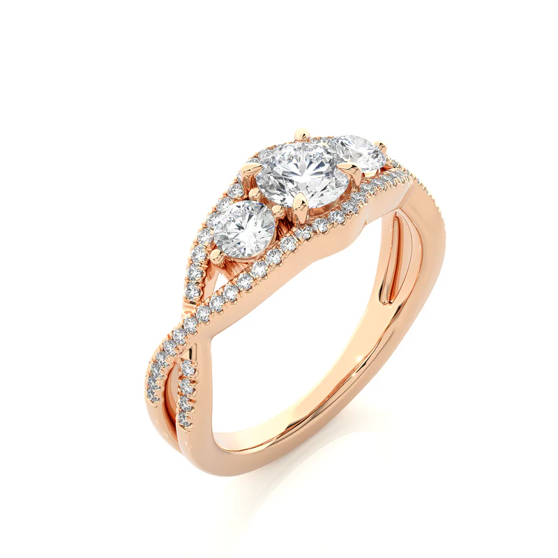 Angled view of 2 carat round moissanite three stone twisted engagement ring in rose gold, showcasing the band and setting
