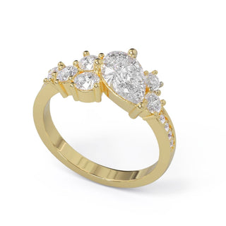 2 Carta Pear and Round Shape Cluster Moissanite Engagement Ring In Yellow Gold