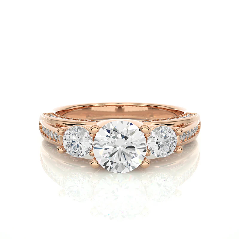 Front view of 2 carat moissanite three stone engagement ring with accents in rose gold, highlighting the brilliant center moissanite stone