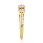 Load image into Gallery viewer, 2 Carat Moissanite Three Stone Engagement Ring With Accents in Yellow Gold
