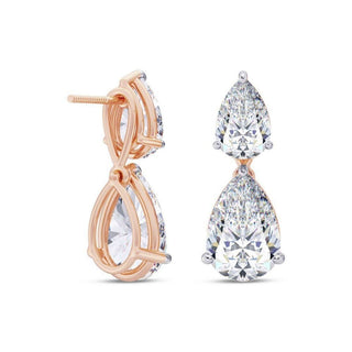 7 Carat Pair Pear Shaped Moissanite Drop Earrings In Rose Gold