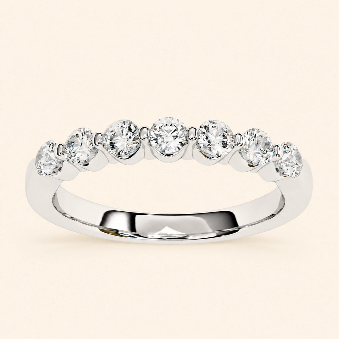 Angle View Of 7 Stone Wedding Band