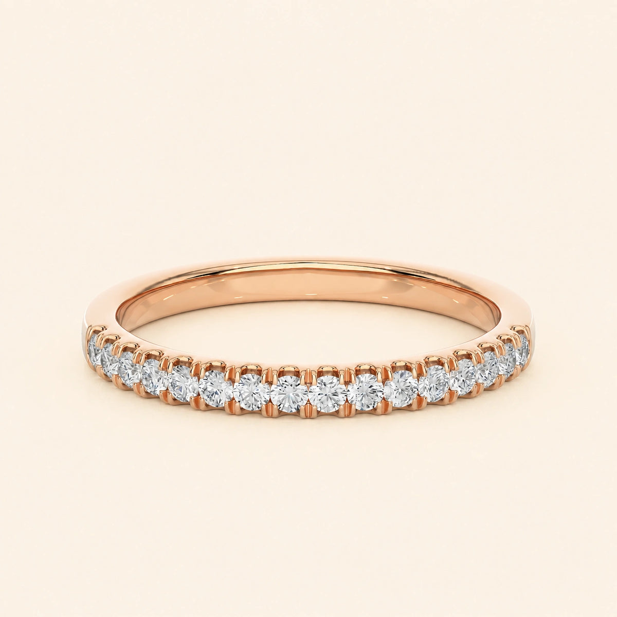 Front view of round half eternity wedding band