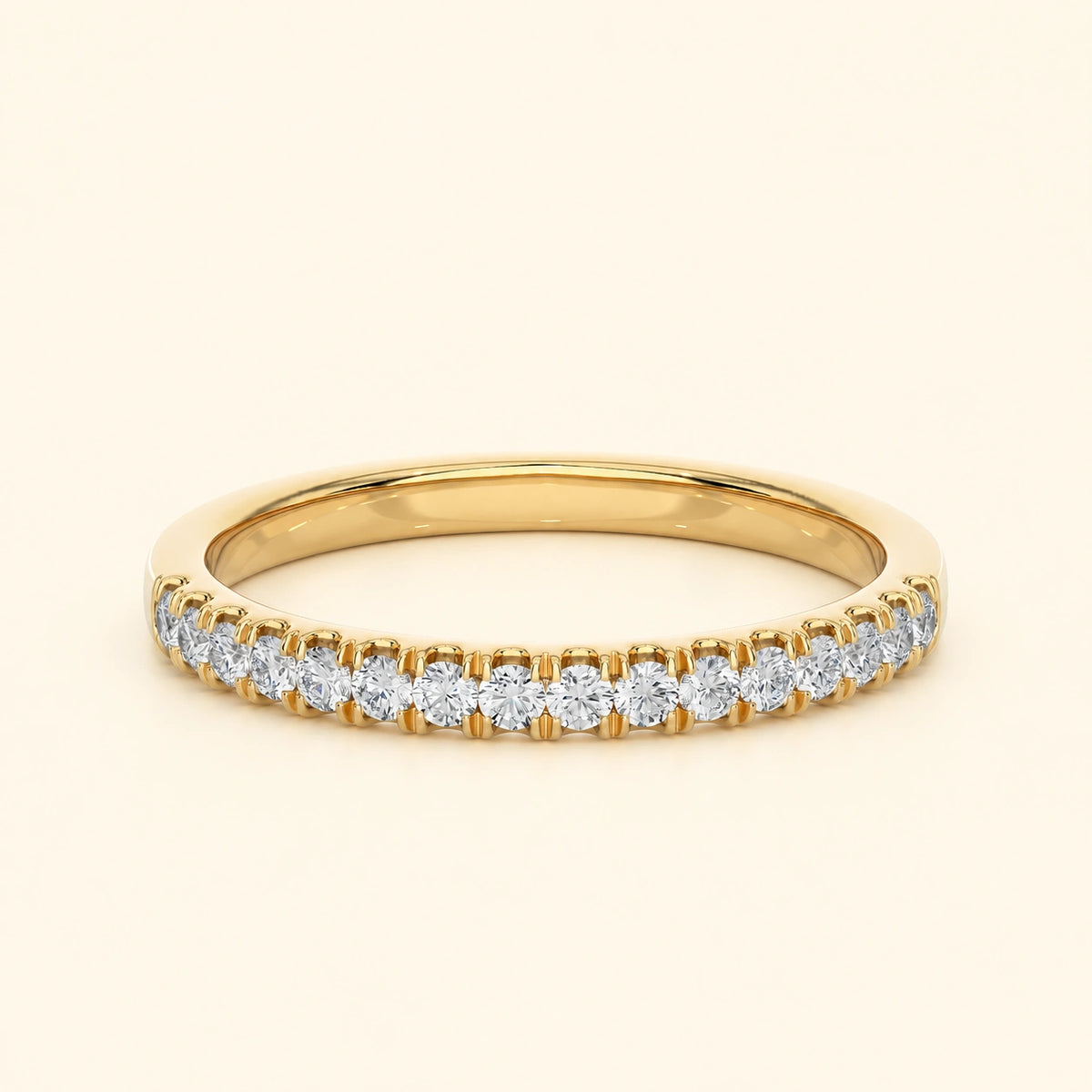 Front view of round half eternity wedding band