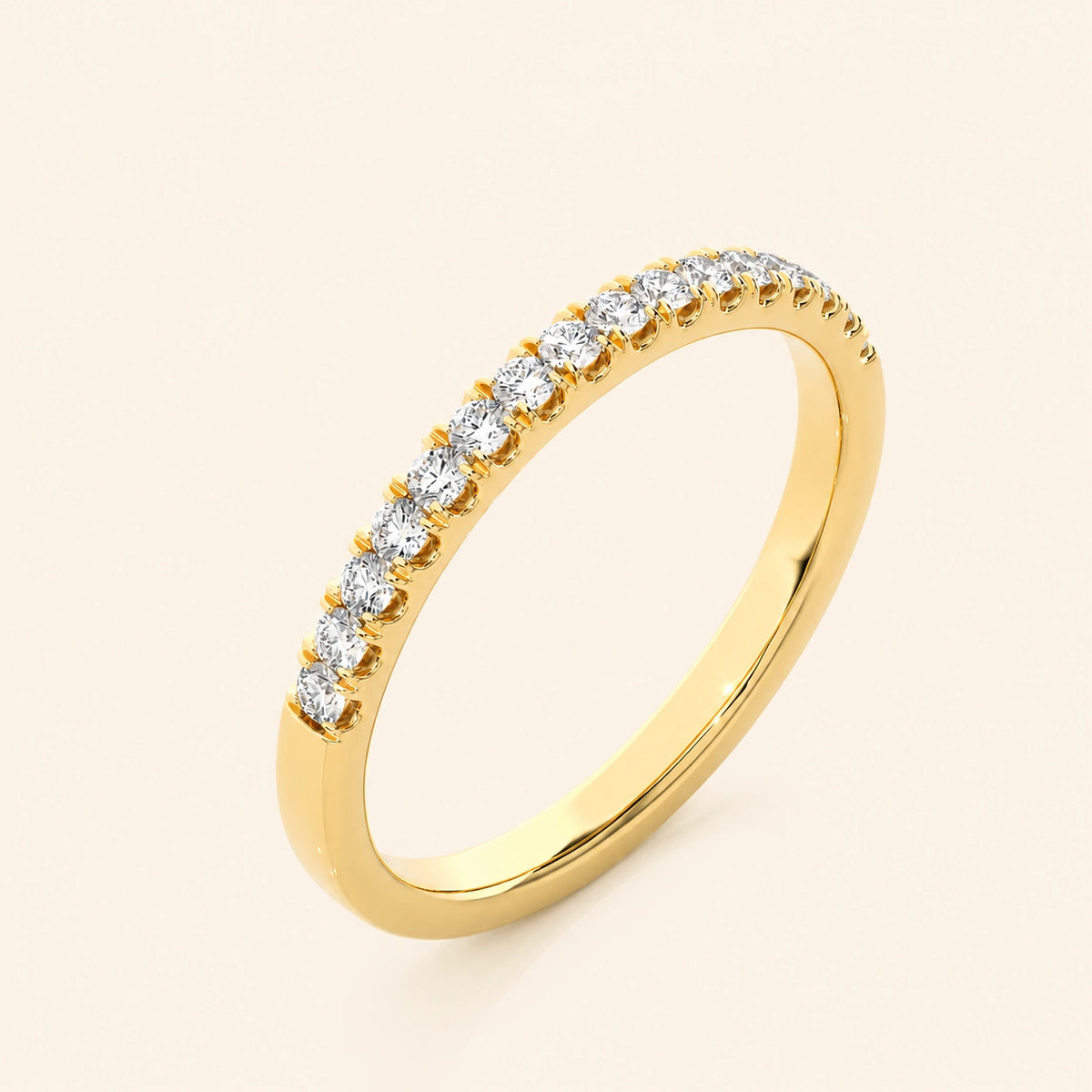 Angle view of round half eternity wedding band