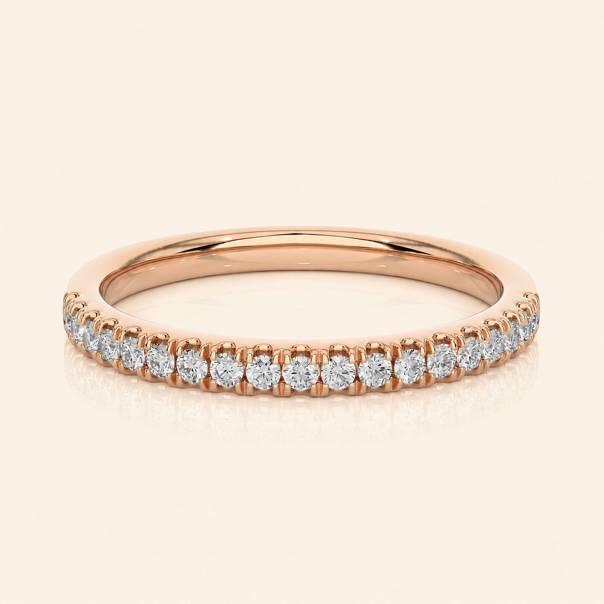 Front view of prong half eternity wedding band