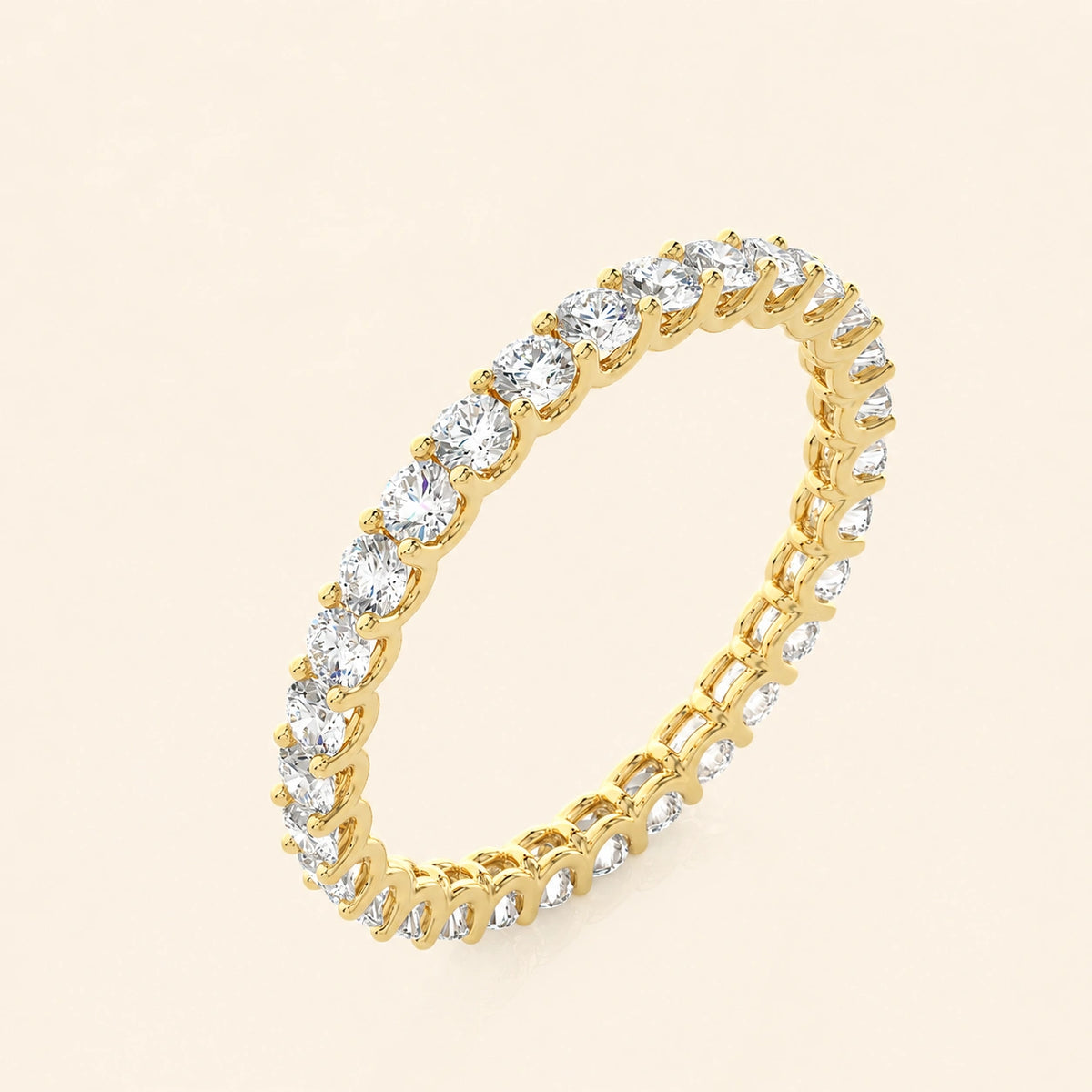Angle view of shared prong eternity band