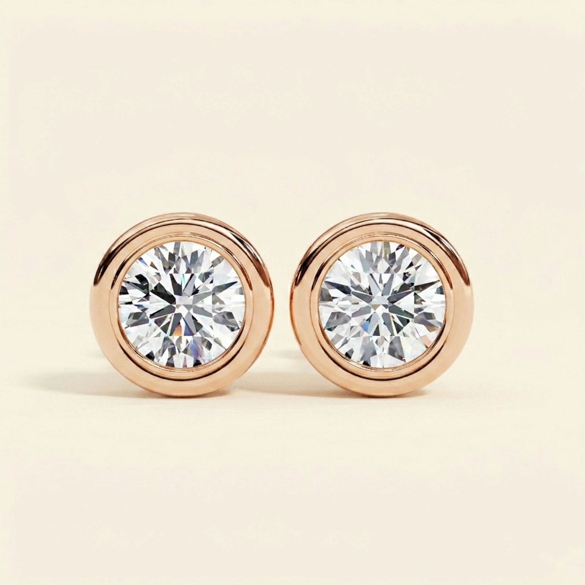 Front view of round solitaire earrings