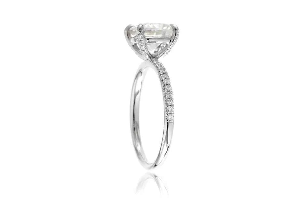 2 carat oval shaped moissanite ring with accent in white gold