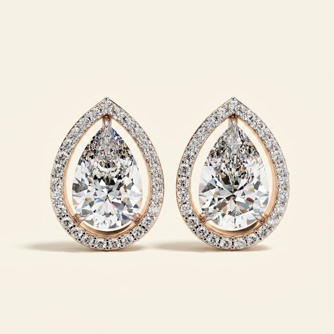 Boucles d'oreilles clous halo poire