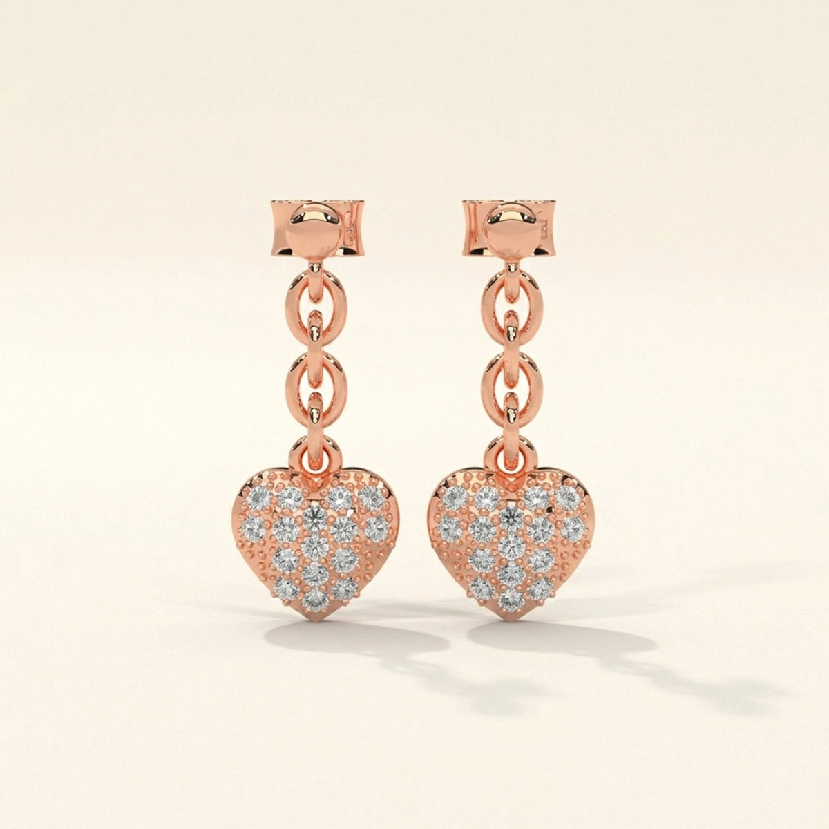 Front view of heart chain drop earrings