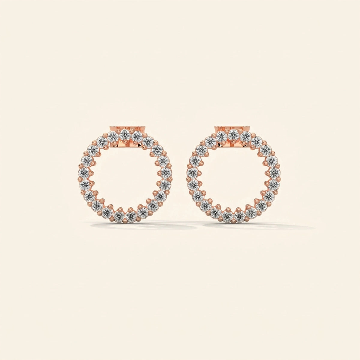 Front view of round halo stud earrings