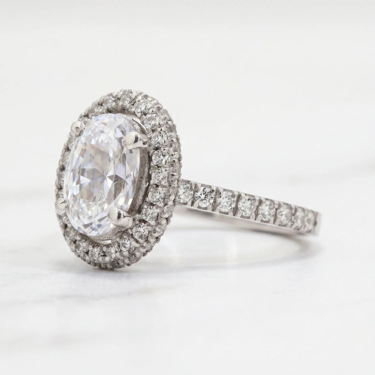 2 carat moissanite oval halo engagement ring in silver