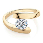 Load image into Gallery viewer, 1.20 ct Round Cut Moissanite Tension Set Solitaire Engagement Ring In Yellow Gold
