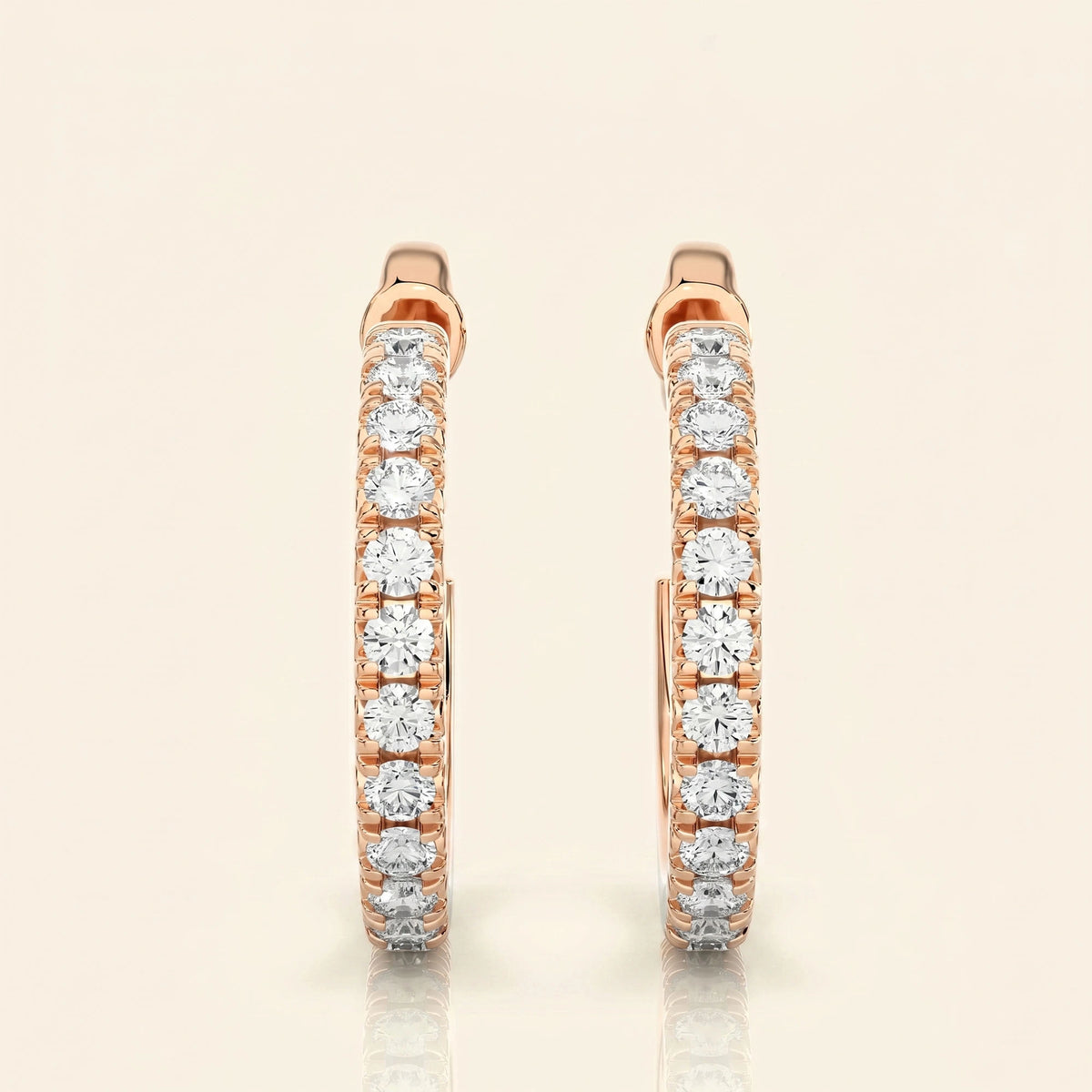 Front view of j hoop earrings