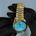 Load image into Gallery viewer, Close Up View Of Oyster Perpetual Day-Date Sky Blue Dial Plain Watch In Yellow Gold
