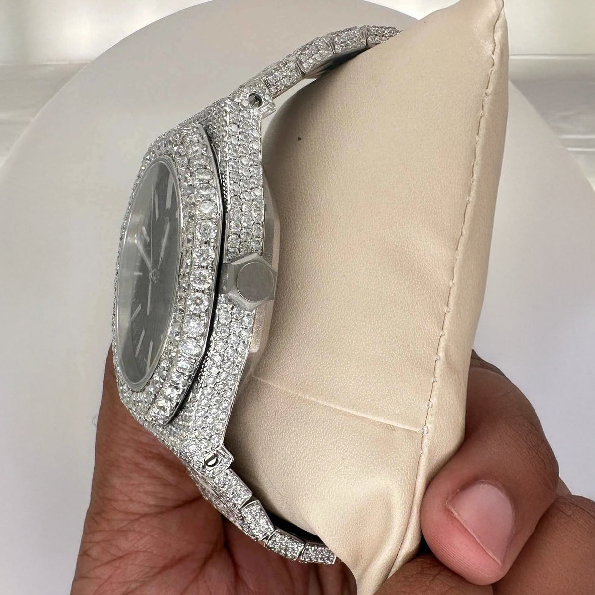 Side view of bust down ap moissanite watch